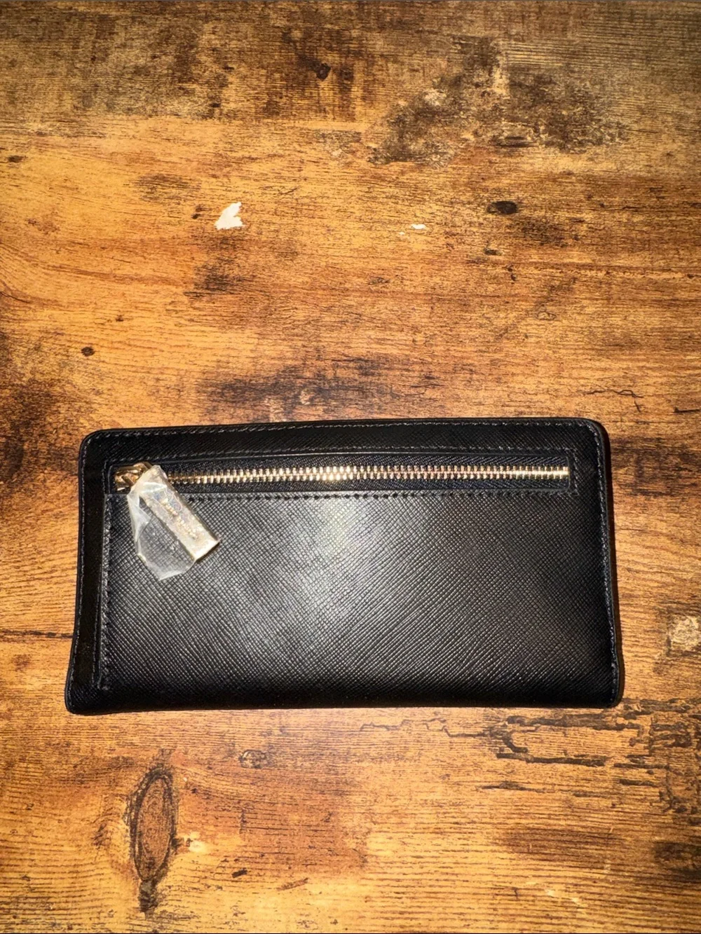 kate spade Black Saffiano Zip Around Wallet with Gold Logo